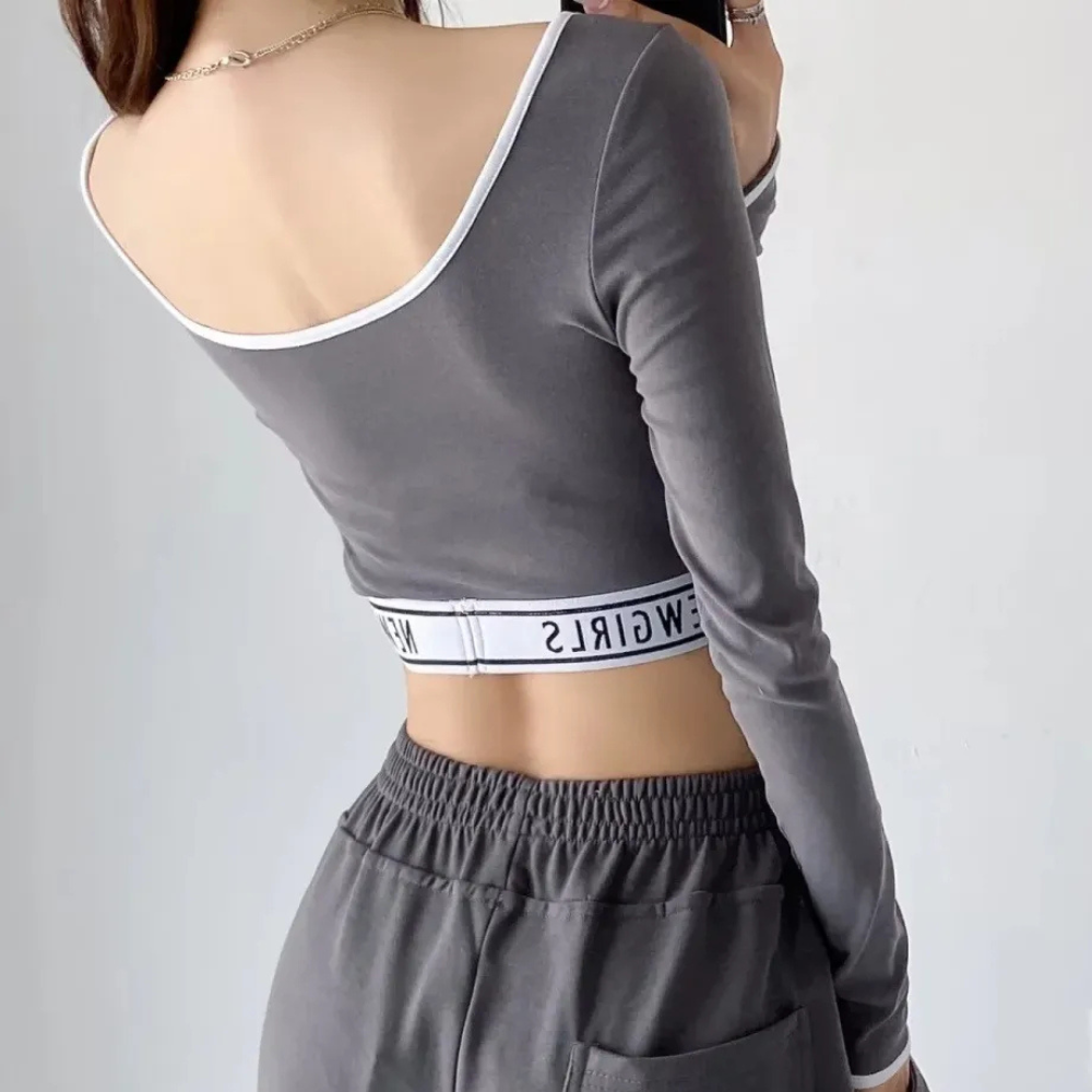 Geribbelde knoopcrop top - stijlvolle dames top met lange mouwen