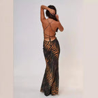 Verleidelijke maxi-jurk met tijgerprint en diepe halslijn - Bakkermode.nl