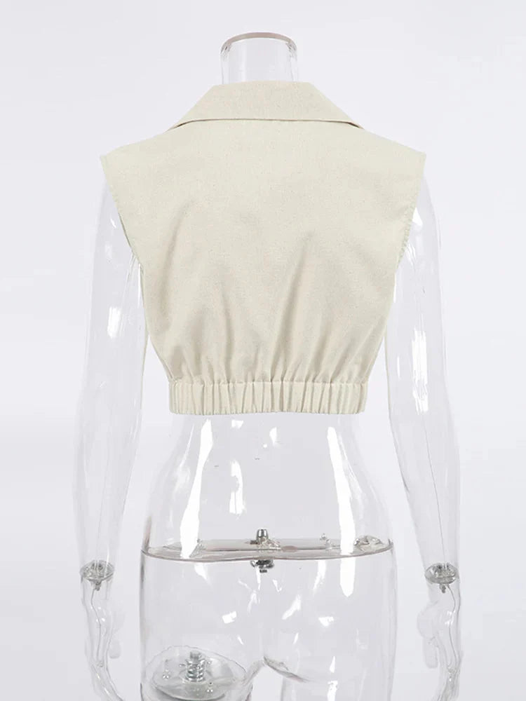 Beige mouwloze blazer top - Bakkermode.nl