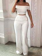 2-delige witte off-shoulder crop top en broek set - chique avondoutfit