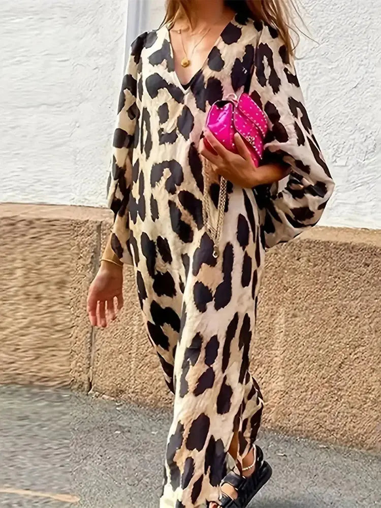 Midi-jurk met luipaardprint en driekwart mouwen - Bakkermode.nl