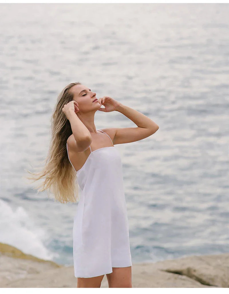 Jurk met spaghettibandjes en strikdetail - Bakkermode.nl