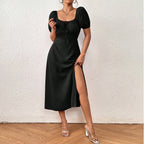 Elegante zwarte jurk met pofmouwen - Bakkermode.nl