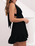 Jurk met diepe V-hals en ruches - Bakkermode.nl