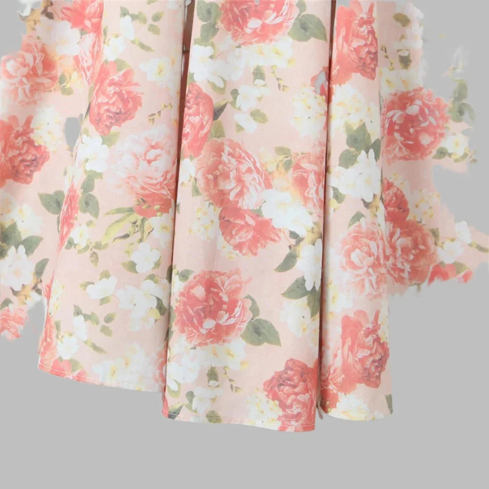 Bloemenjurk met strikbandjes en split - Bakkermode.nl