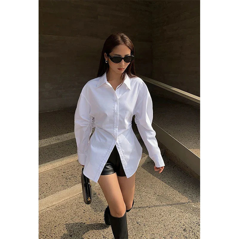 Witte oversized blouse met lange mouwen - Bakkermode.nl