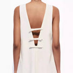 Jurk met open rug en strikdetails - Bakkermode.nl