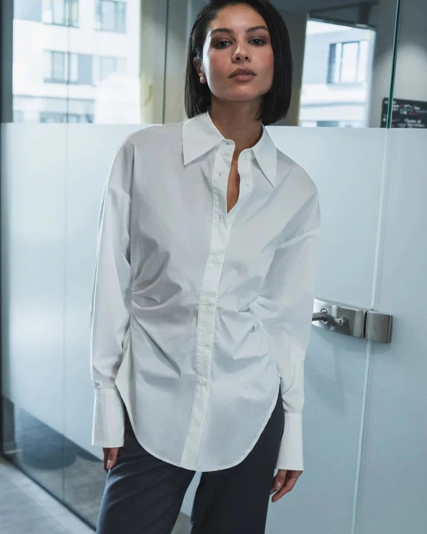 Witte getailleerde blouse met lange mouwen - Bakkermode.nl