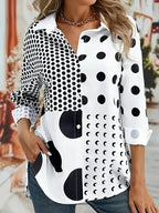 Zwart-witte blouse met stippen en geometrische patronen - Bakkermode.nl