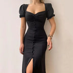 Jurk met pofmouwen en knoopdetails - Bakkermode.nl