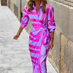 Damesjurk - modieuze wikkeljurk met gedurfde streepjespatroon