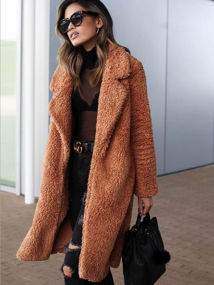 Lange imitatiebont jas - luxe dames outerwear - Bakkermode.nl