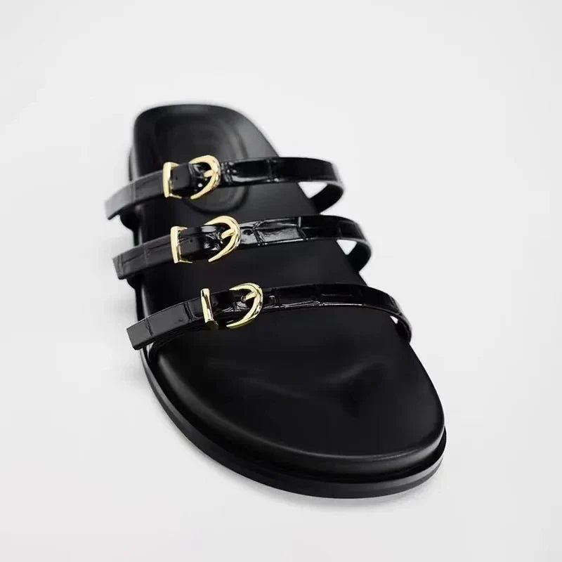 Zwarte slidesandalen met gespen - Bakkermode.nl