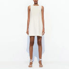 Jurk met open rug en strikdetails - Bakkermode.nl