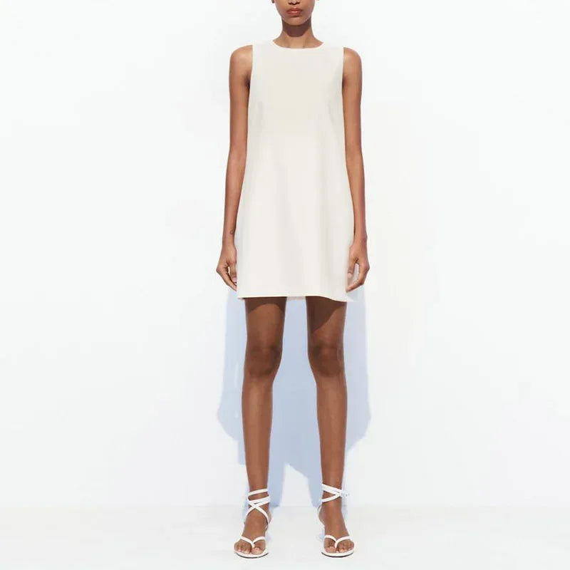 Jurk met open rug en strikdetails - Bakkermode.nl