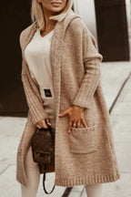 Knusse gebreide vest met capuchon dames - stijlvolle lange winterjas - Bakkermode.nl