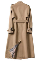 Trenchcoat met dubbele knopenrij voor dames - lange jas met ceintuur - Bakkermode.nl
