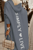 Knusse gebreide vest met capuchon dames - stijlvolle lange winterjas - Bakkermode.nl