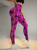 Fuchsia leggings met gescheurde details - Bakkermode.nl