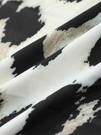 Midi-jurk met luipaardprint en driekwart mouwen - Bakkermode.nl