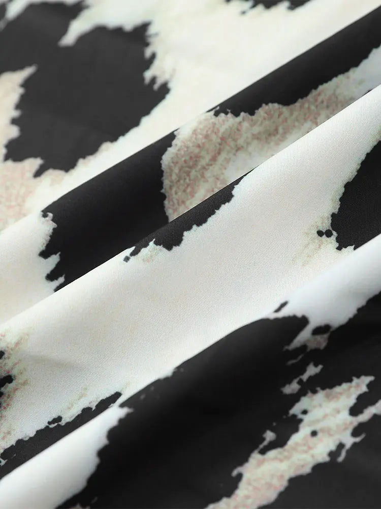 Midi-jurk met luipaardprint en driekwart mouwen - Bakkermode.nl