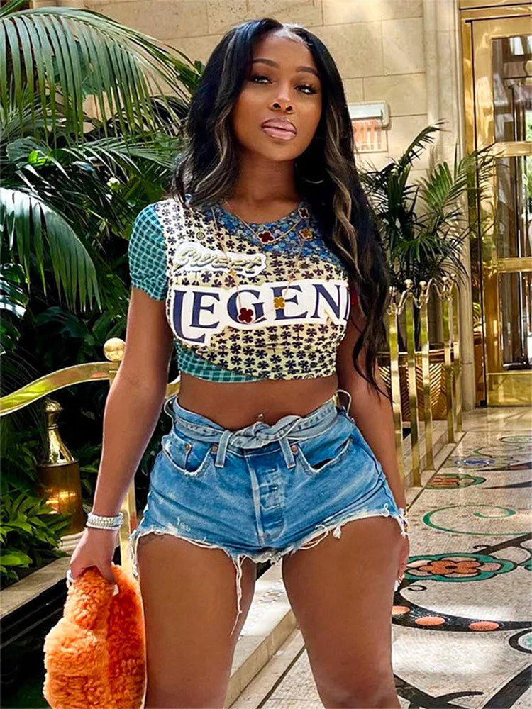 Trendy korte top met print en tekst - Bakkermode.nl