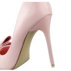 Dames hoge hakken met strikdetail - elegante spitse pumps voor vrouwen