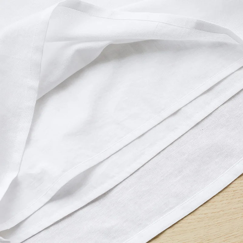 Jurk met spaghettibandjes en strikdetail - Bakkermode.nl