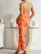 Bodycon jurk met bloemenprint en spaghettibandjes - Bakkermode.nl