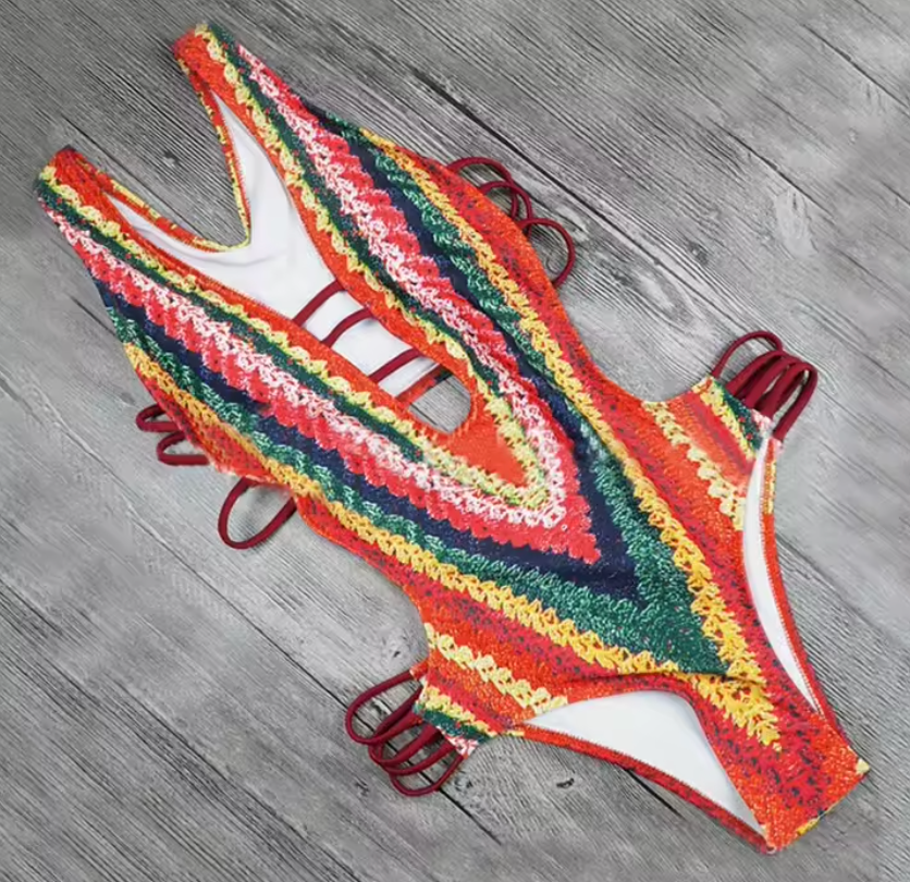 Kleurrijke bedrukte monokini met diepe v-rug - Bakkermode.nl