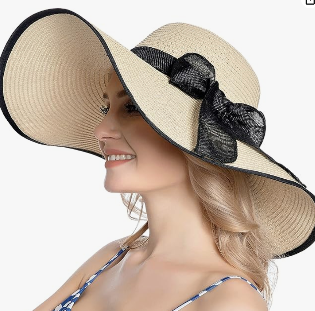 Brede rand zonnehoed met strikdecor voor op het strand - Bakkermode.nl