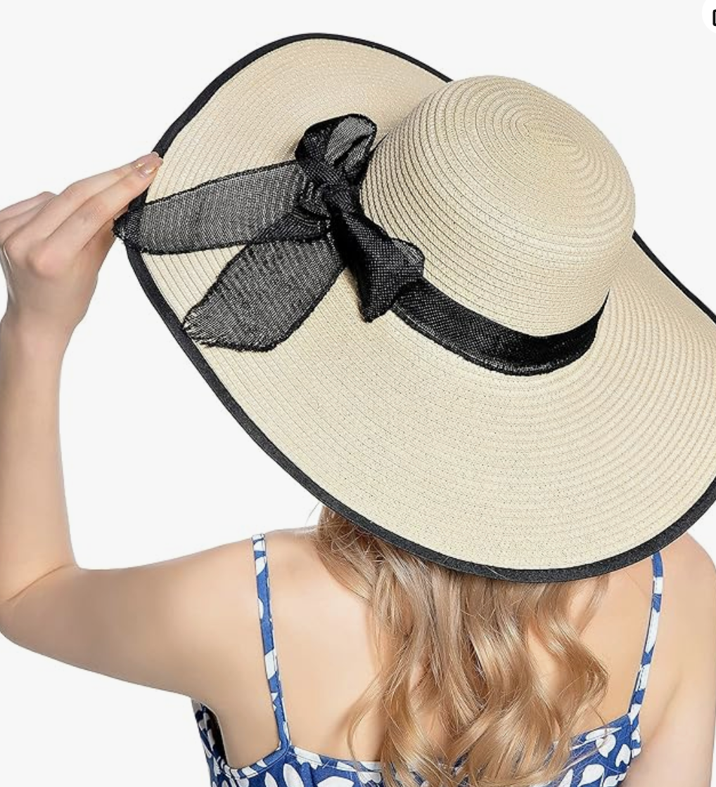 Brede rand zonnehoed met strikdecor voor op het strand - Bakkermode.nl