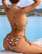 Stijlvol badpak met uitsnijdingen en o-ring detail - Bakkermode.nl