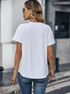 Casual witte top met zak - Bakkermode.nl