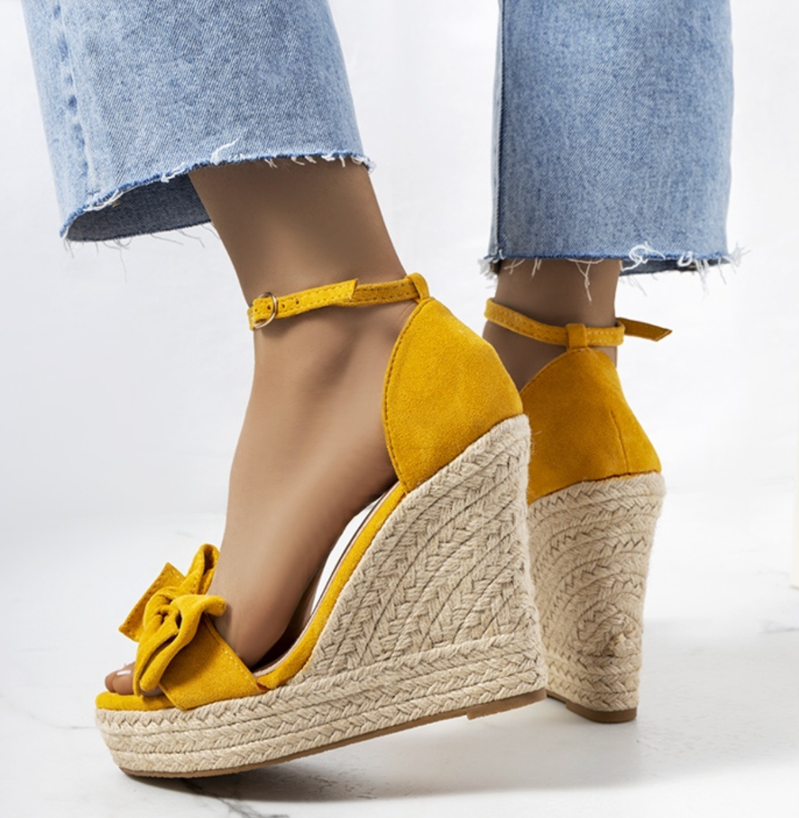 Gele sleehaksandalen met strikdetail - Bakkermode.nl