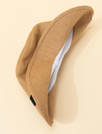 Stijlvolle strohoed met zwarte band - Bakkermode.nl