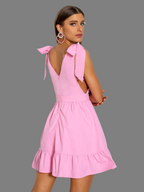 Mini-jurk met diepe V-hals en strikbanden - Bakkermode.nl