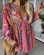 Boho jurk met levendige print en wijde mouwen - Bakkermode.nl