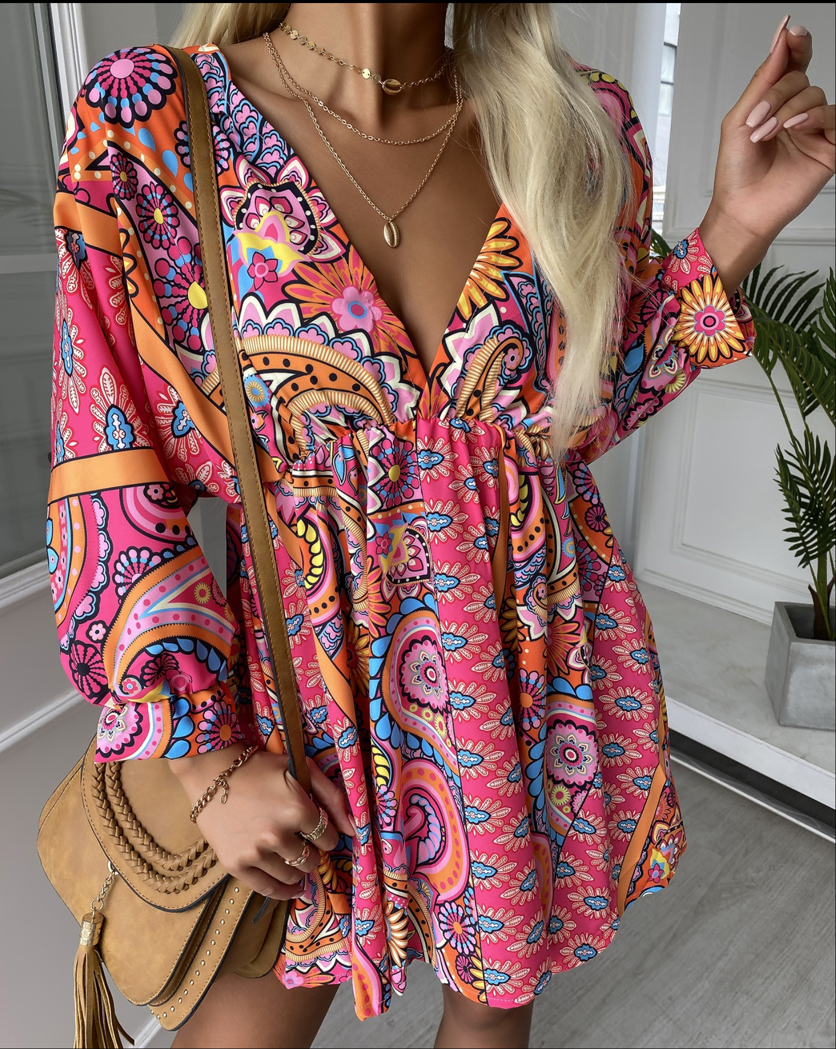 Boho jurk met levendige print en wijde mouwen - Bakkermode.nl