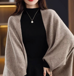 Poncho met knoopsluiting - elegante gebreide wrap voor dames