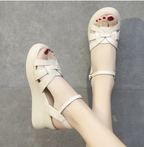 Witte sleehaksandalen met enkelband