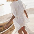 Jurk met V-hals en wijde mouwen - Bakkermode.nl