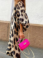 Midi-jurk met luipaardprint en driekwart mouwen - Bakkermode.nl