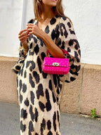 Midi-jurk met luipaardprint en driekwart mouwen - Bakkermode.nl