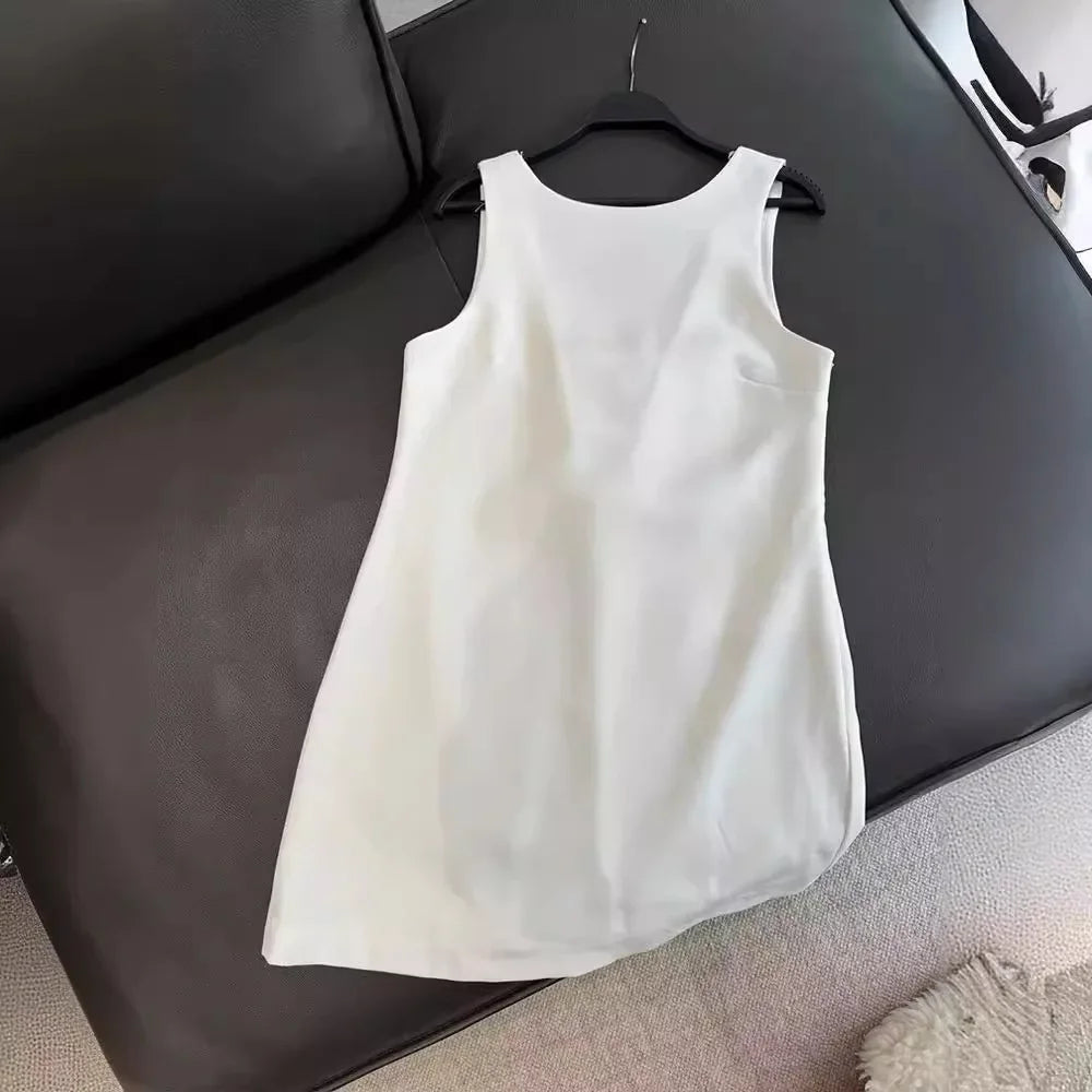 Jurk met open rug en strikdetails - Bakkermode.nl