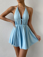 Halterjurk met diepe V-hals en strikbanden - Bakkermode.nl