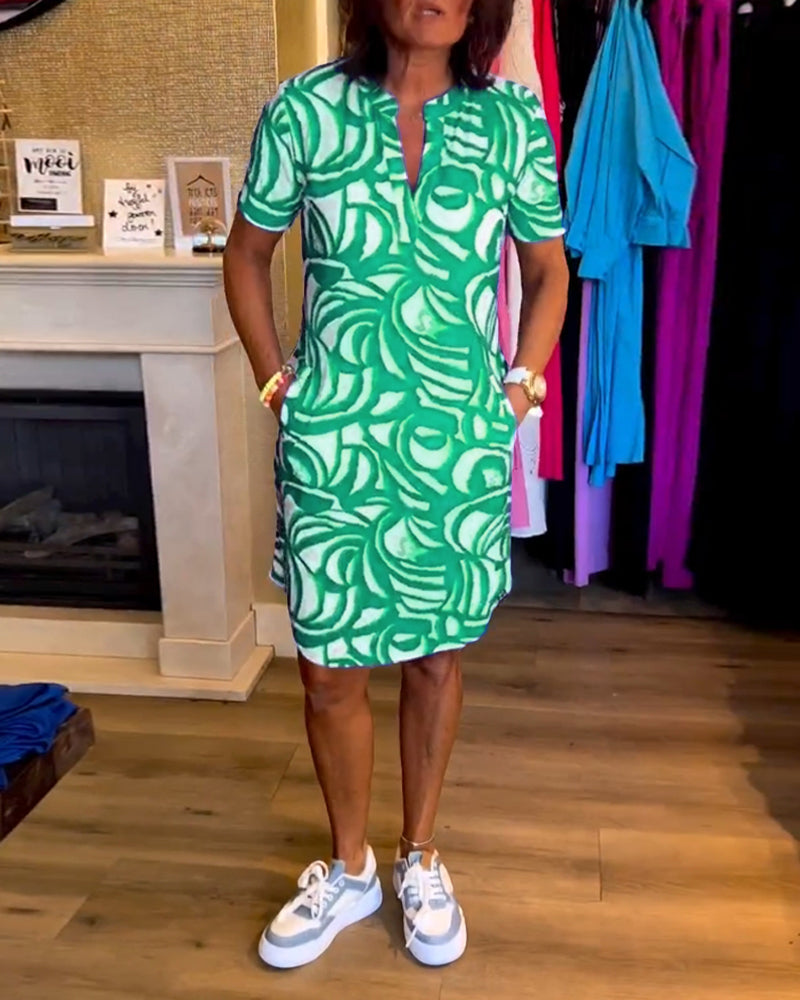 Dames kortemouwen jurk met abstracte print - casual zomeroutfit, relaxed fit