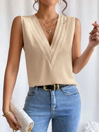 Mouwloze blouse - verfijnde dames top met geplooide details