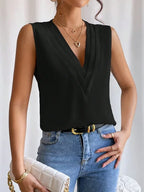 Mouwloze blouse - verfijnde dames top met geplooide details