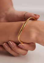 Damescuffarmband - stijlvolle gouden accessoire voor casual of avondkleding